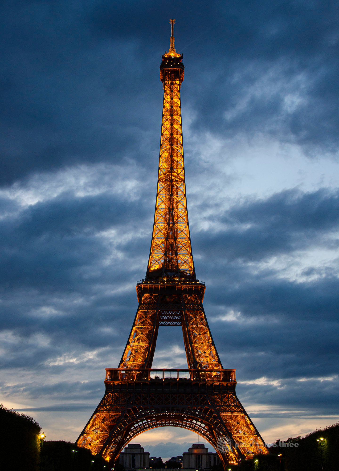 Eiffel Tower at Sunset with lights on, Paris, France