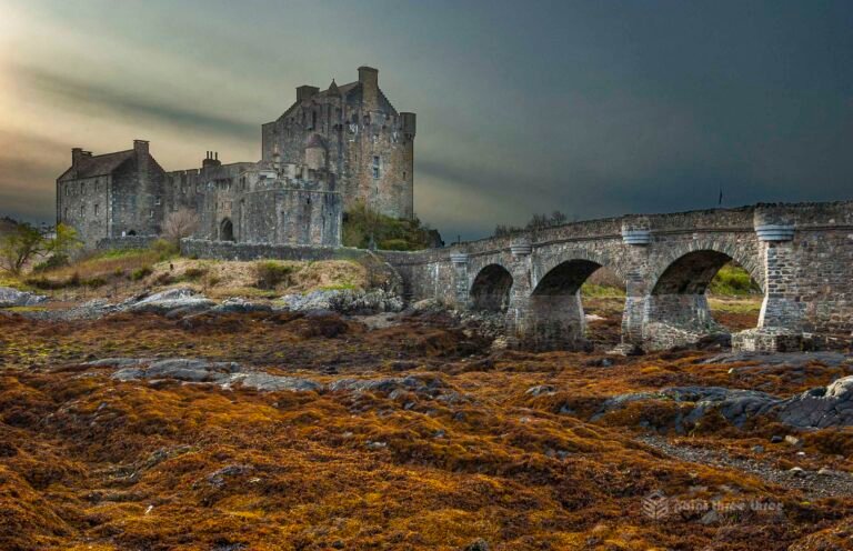Eilean Donan Castle in Scotland with the tide out