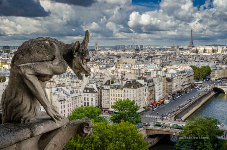 Gargoyle and Eiffel Tower from Notre Dame Cathedral Paris France