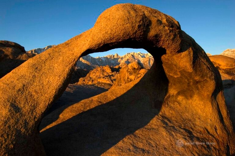 Sunrise at Mobius Arch with Mount Whitney in the Alabama Hills range.