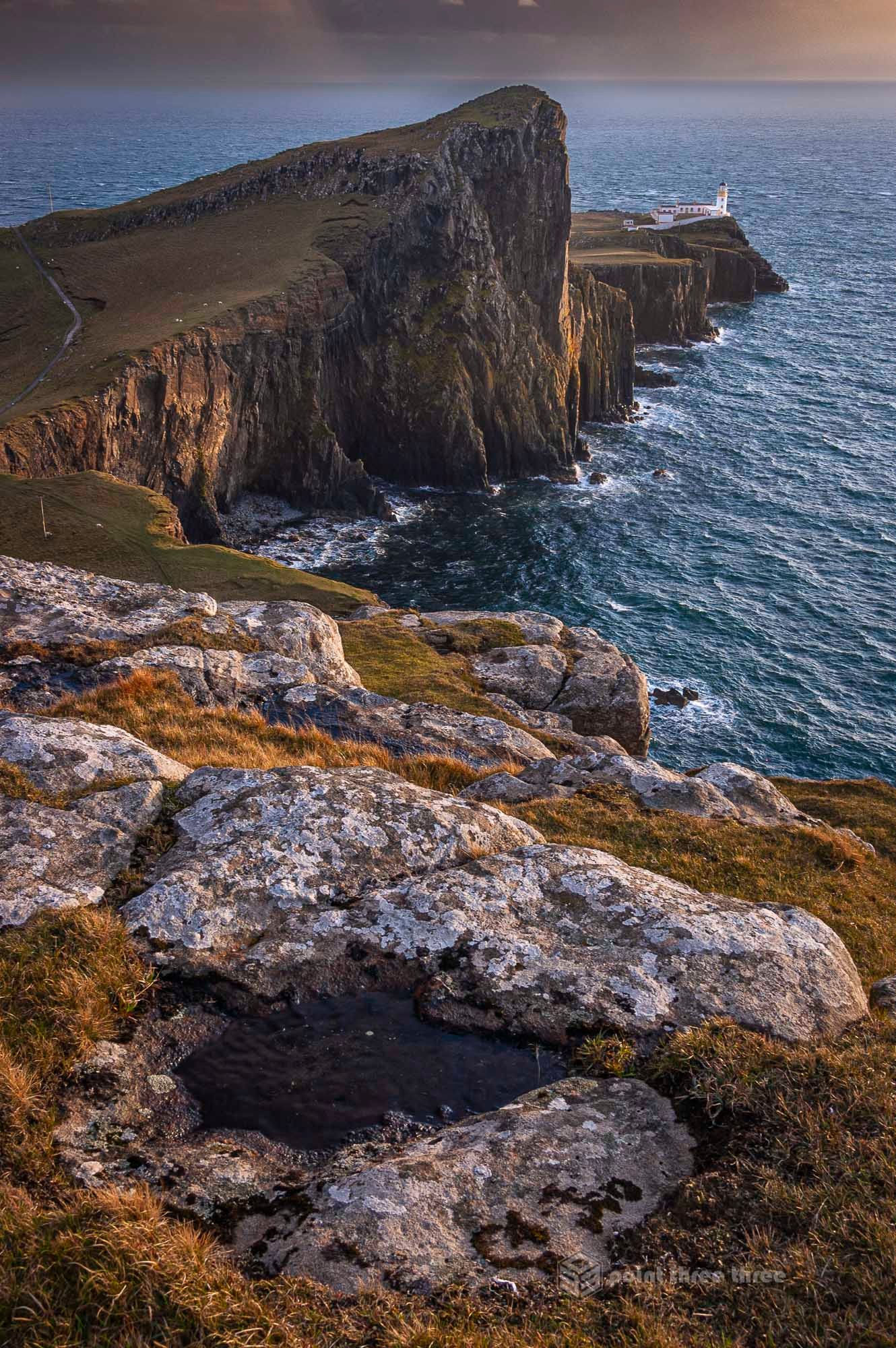 Sunset at Neist Point Lighthouse in the Isle of Skye Scotland.