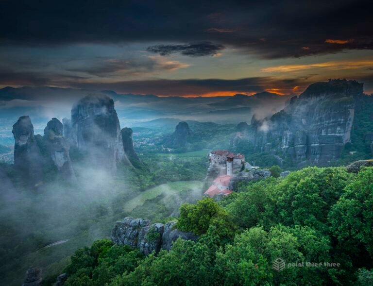 Sunset Rock view at sunset of Monastery of St. Rousanou and St. Nicholas Anapausas, Meteora, Greece