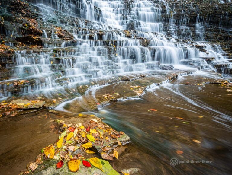 Albion Water Fall in Hamilton Ontario. Cascading waterfall with fall colours surrounding.