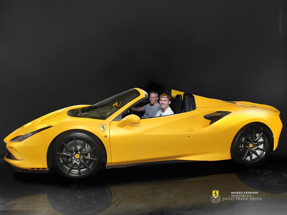 Yellow Ferrari F8 Spider convertible parked outside the Ferrari Museum in Maranello, showcasing its aerodynamic V8 design and Giallo Modena paint.