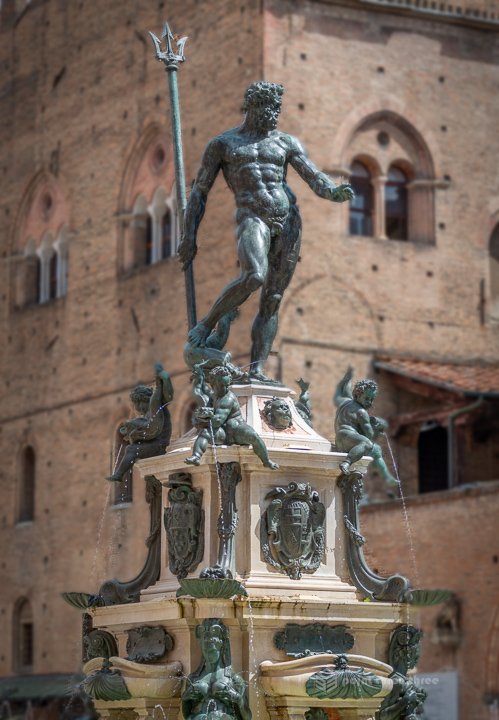 The bronze Statue of Neptune by Giambologna atop the Fountain of Neptune in Piazza del Nettuno, Bologna