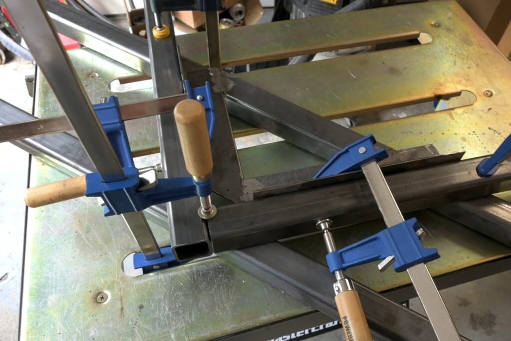 Clamping for welding steel base frame