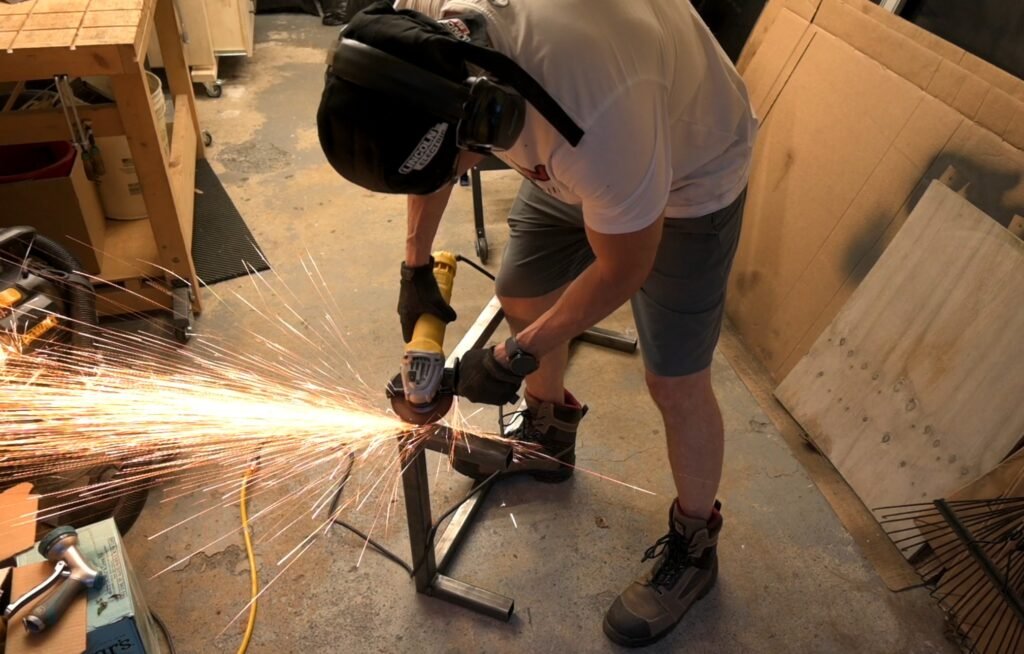 Grinding all the welded joints for paint preparation