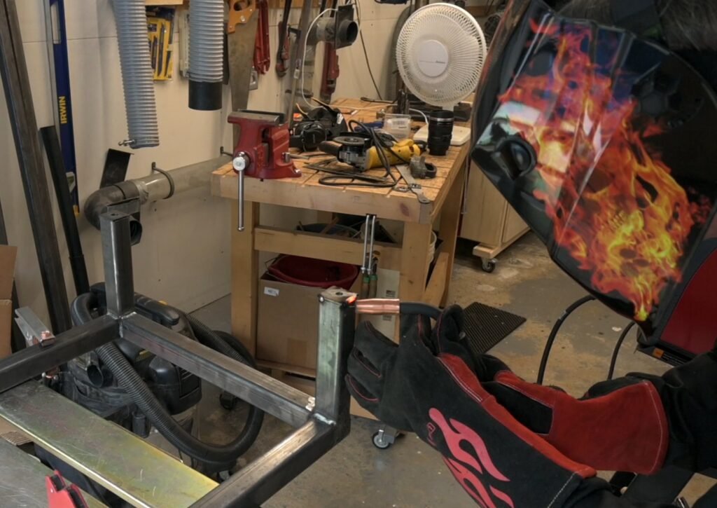 Welding the nut for adjustable feet to the legs