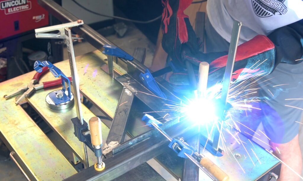 Welding the square steel bottom frame