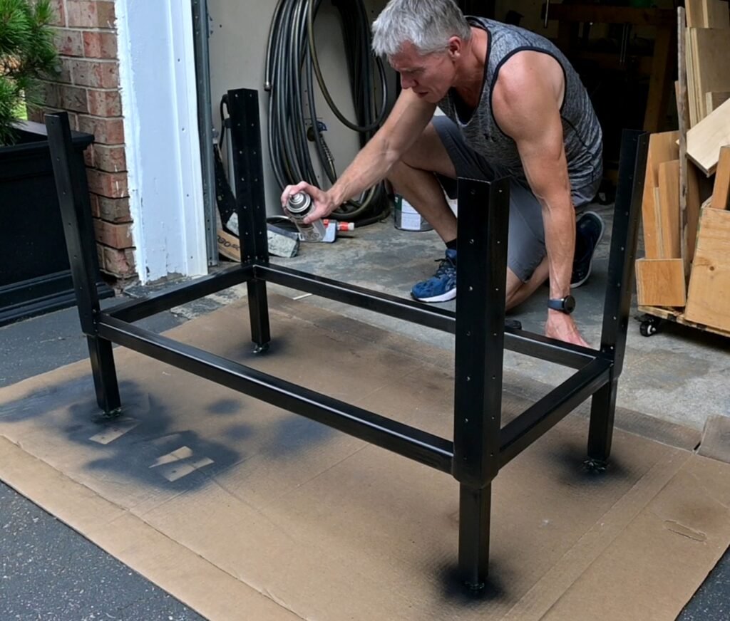 Painting and rustproofing the steel frame