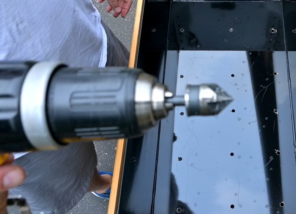 Counter sink and deburring of ACM drainage holes